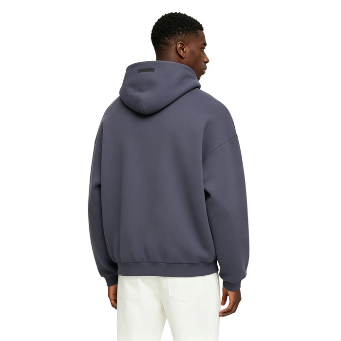 Fear of God Essentials Fleece Hoodie Marine worn from the back