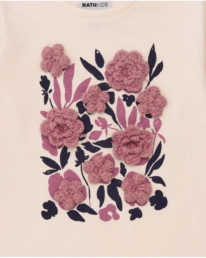 Long-sleeved off-white t-shirt for girls with floral appliqués