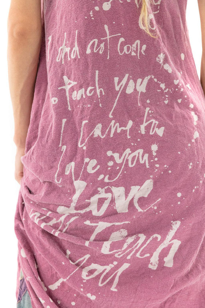 Magnolia Pearl artisan dress with whimsical handwritten white text on vintage mauve fabric
