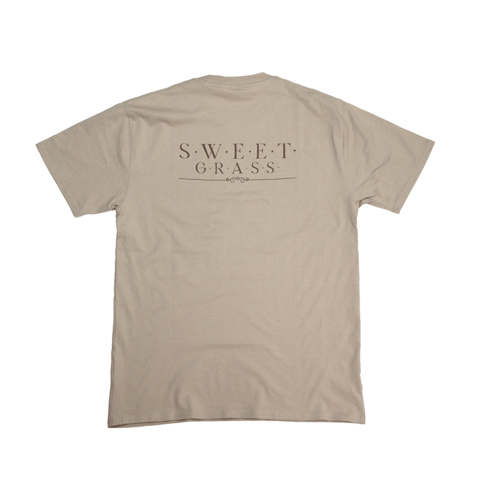 Flat lay back view of Sweetgrass Medicine Tee in beige