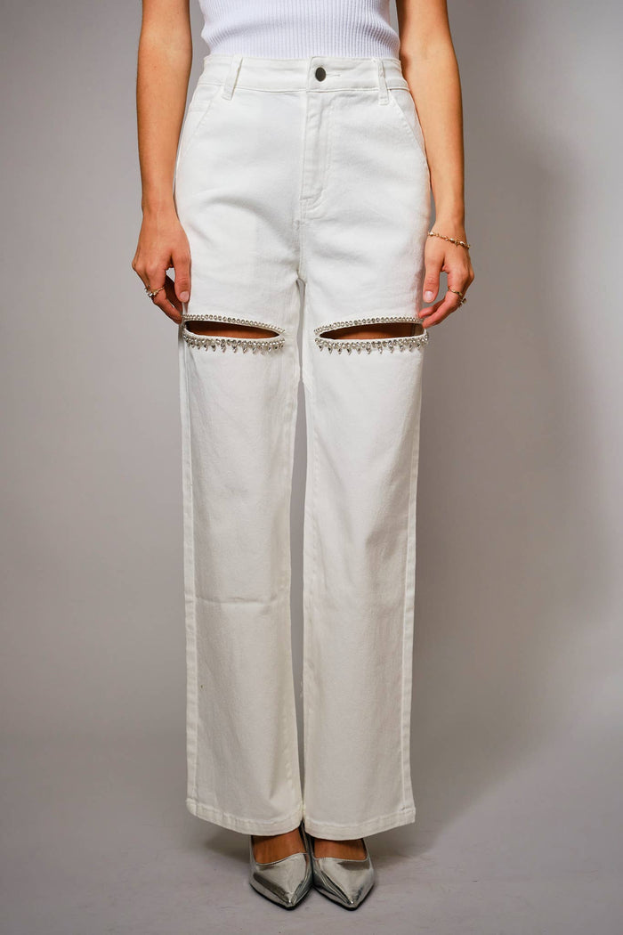 Blue B white washed denim jeans with front cut out details, rhinestone trim, and a wide leg silhouette.