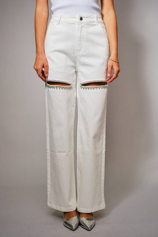 Blue B white washed denim jeans with front cut out details, rhinestone trim, and a wide leg silhouette.