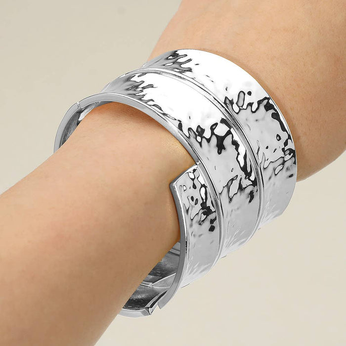 Style the Bold Wide Textured Metal Hinged Bangle Bracelet exclusively at Born To Glam