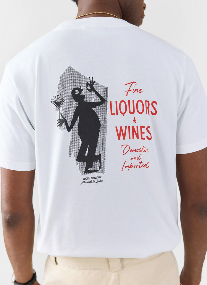 A model wears the Percival Carlo Mixologist T-shirt in white, seen from behind to showcase the vintage graphic.