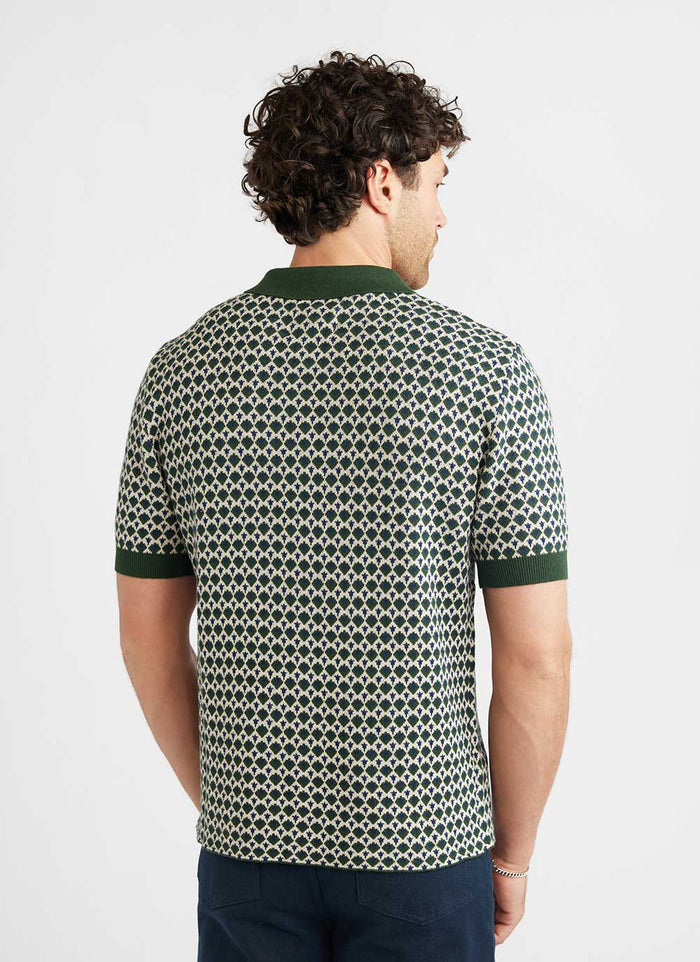 Back view of a male model wearing the green jacquard Casa Piccante knitted cotton shirt from Percival.