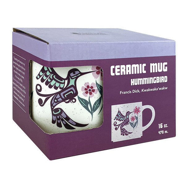 Ceramic mug with hummingbird design in packaging on a white background