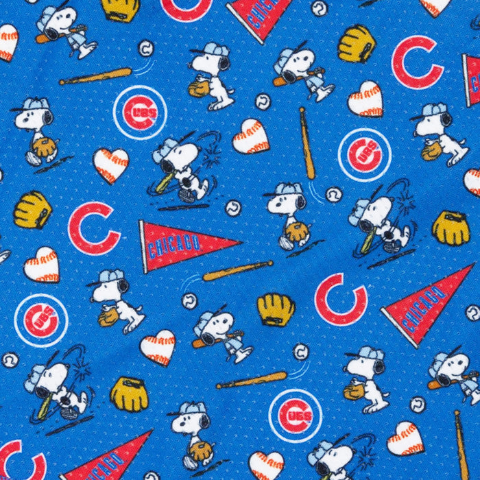 The Sassy Woof Dog Bandana - MLB™ x Peanuts™ Chicago Cubs™ features blue fabric with Snoopy baseball graphics, Cubs logos, baseball gear, hearts, and “CHICAGO” pennants in vibrant red, white, yellow, and blue.