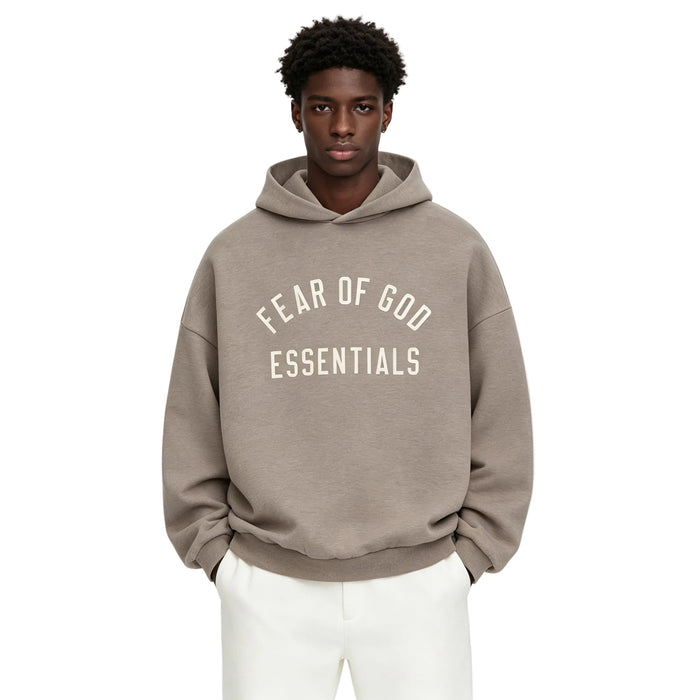 Fear of God Essentials Fleece Hoodie Heather Gray worn from the front