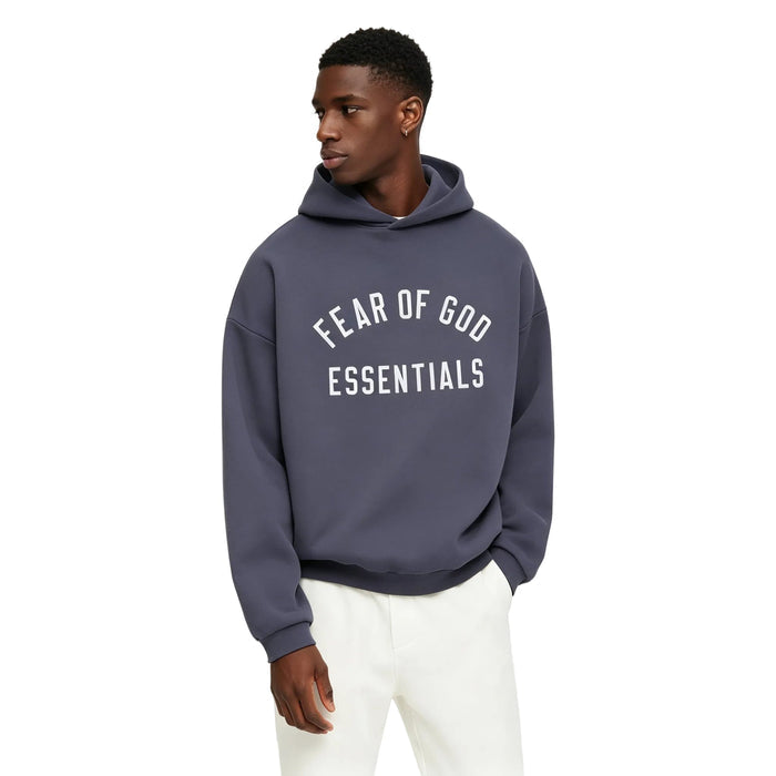 Fear of God Essentials Fleece Hoodie Marine worn from the front