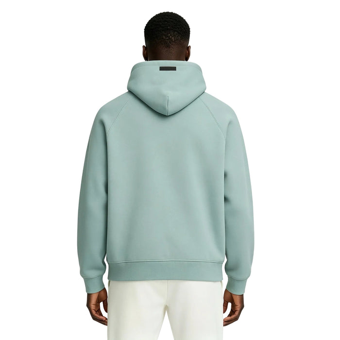 Fear of God Essentials Hoodie Sycamore worn from the back