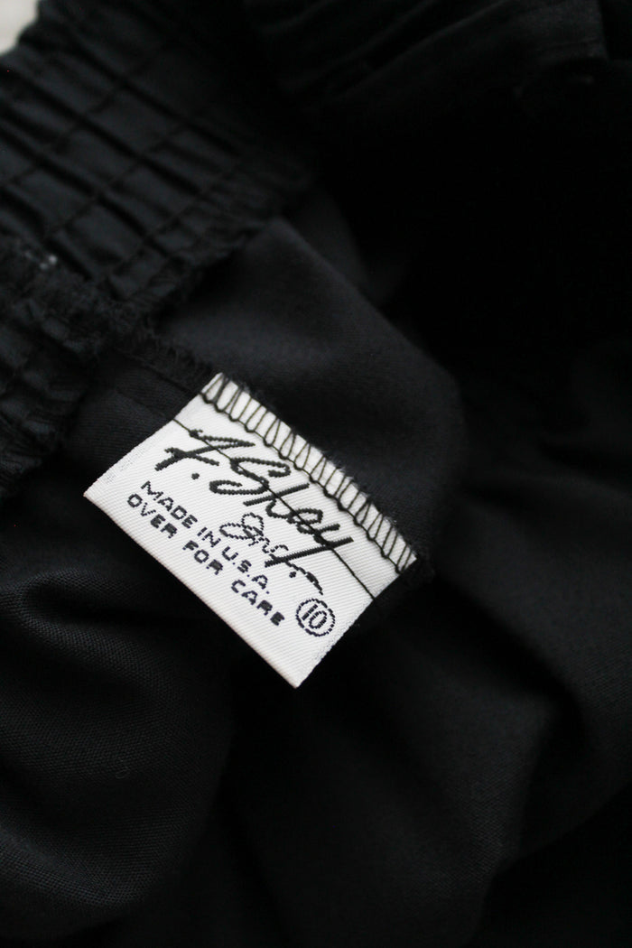 flared black midi skirt