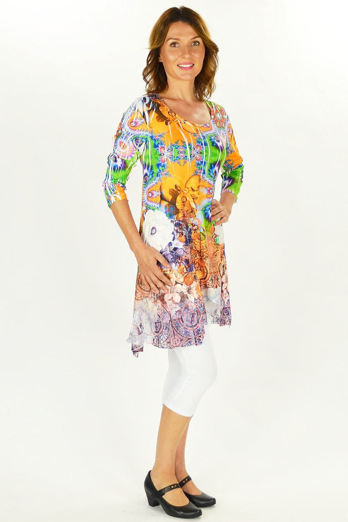 David Jessie Gem Tunic displayed on a model, featuring a flowing, stylish tunic with intricate details and vibrant gemstone-inspired accents.
