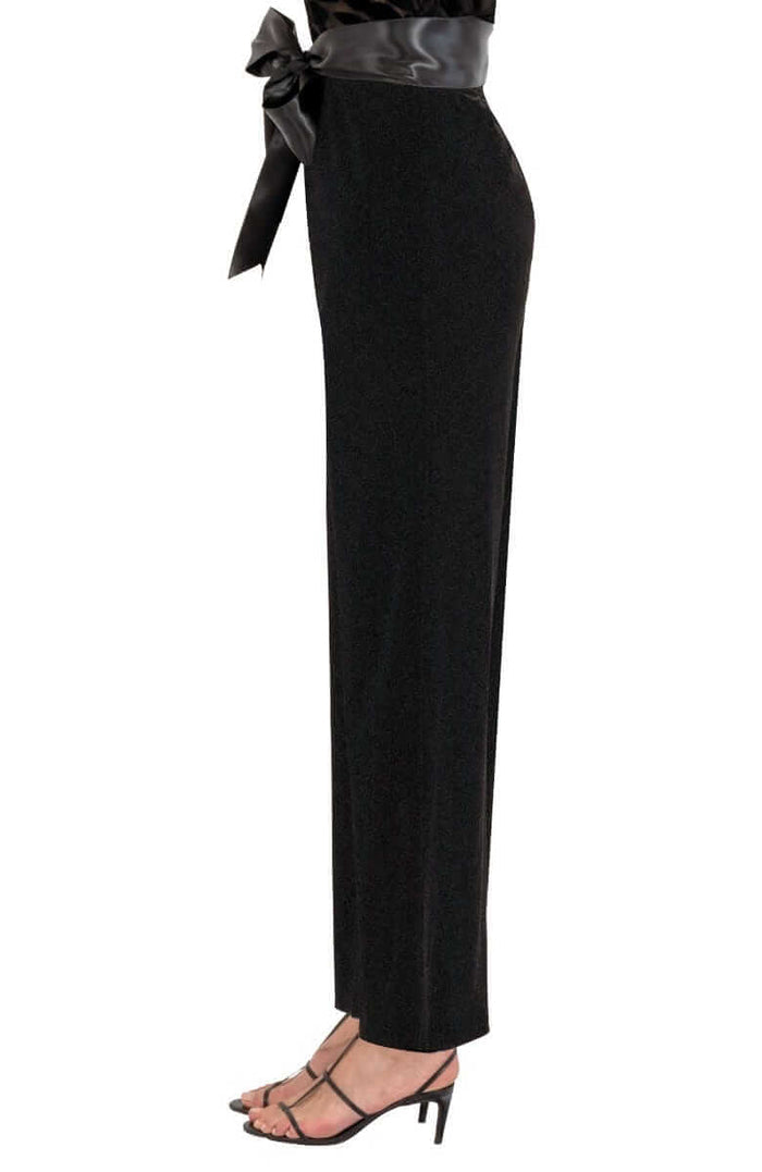Black velvet pants with a black satin belt on a white background