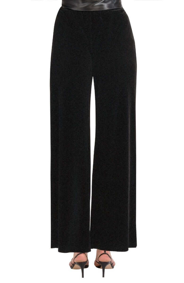 Black velvet pants with a black satin belt on a white background