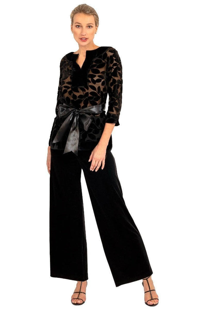 Black velvet pants with a black satin belt on a white background