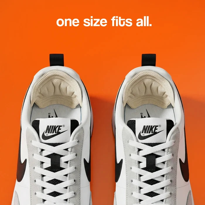 Heel cushion pads in a neutral color, positioned inside white Nike sneakers against an orange background.