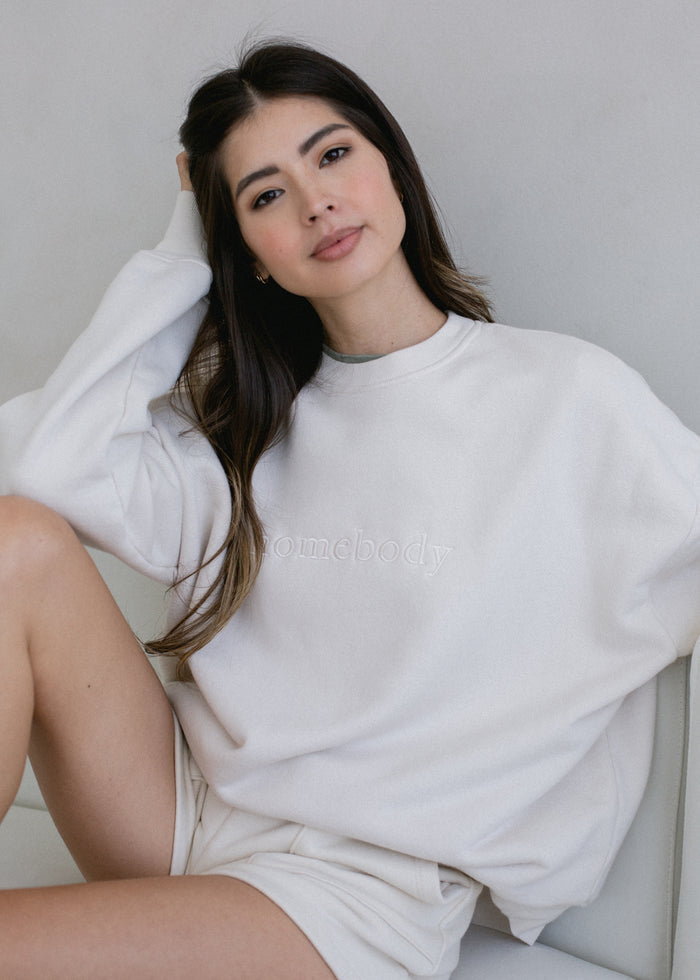 Back view of Homebody Crewneck on model