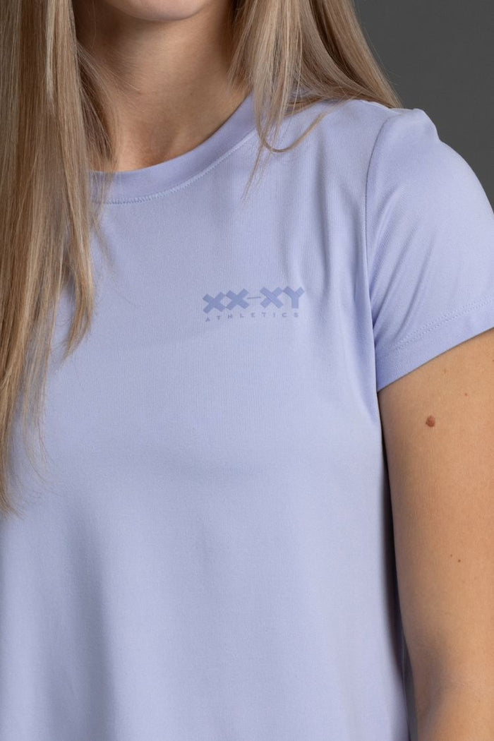 Lavender t-shirt with a logo on a person wearing it || Lavender Gray