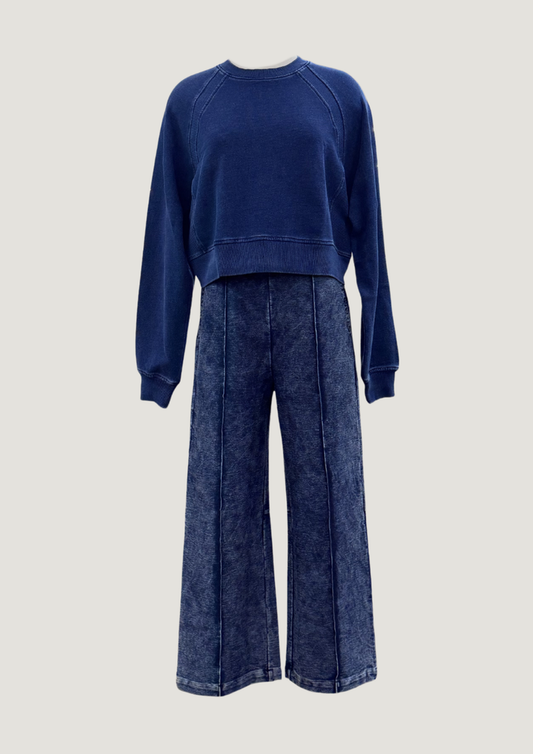 Front view of Indigo Rib Trim Sweatshirt in medium wash on model