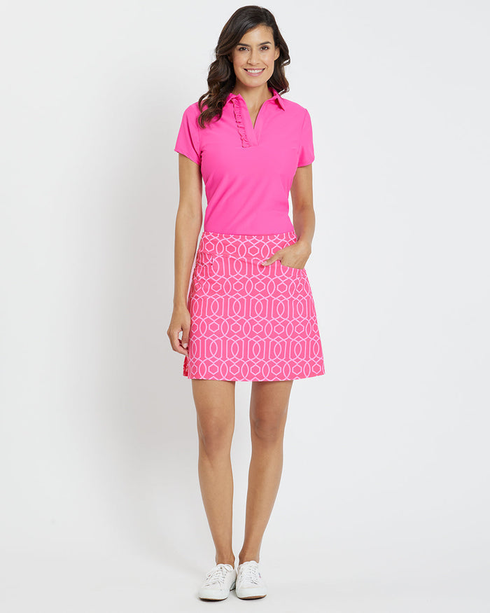 Full body view of model in the Jude Connally Sonia Skort - Garden Gate Spring Light Pink