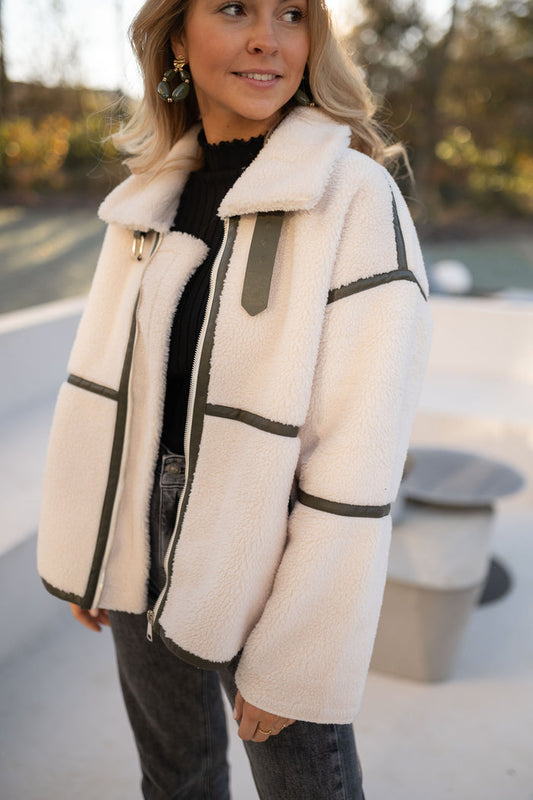 Cream teddy shearling jacket with khaki trim and front zip