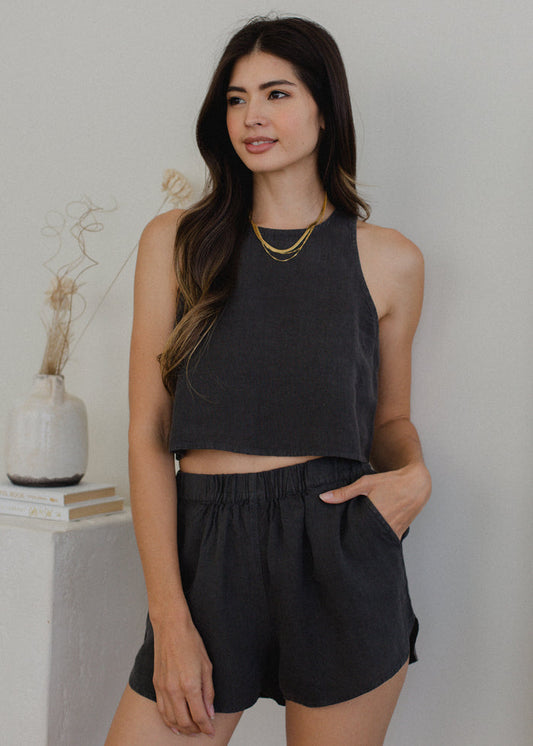 woman wearing linen shorts in charcoal