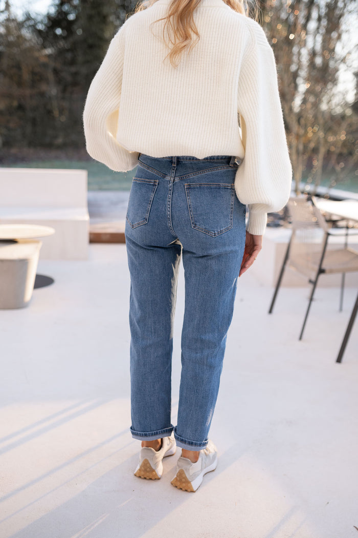 Medium-blue jeans with belt loops and pockets