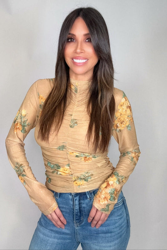 Style the Mustard Floral Mock Neck Ruching Top exclusively at Born To Glam