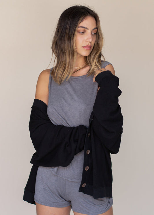 woman wearing oversized cardigan in black