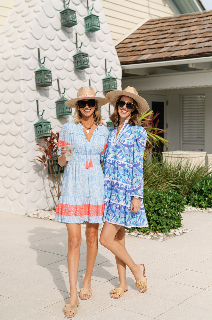 Outdoor model in the Sail To Sable Penelope Long Sleeve Flare Dress