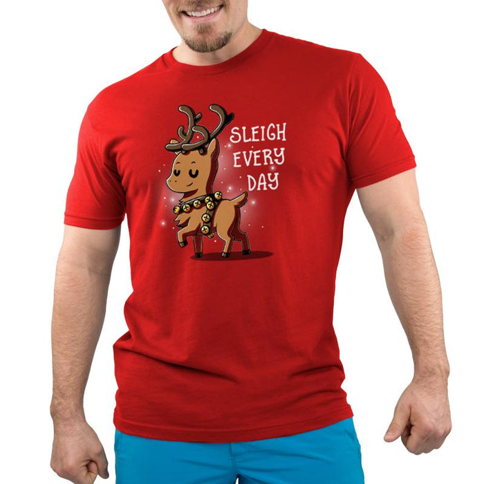 Premium Cotton T-shirt_TeeTurtle Sleigh Every Day red apparel featuring a sassy reindeer wearing bell harness with a Christmas pun next to it.