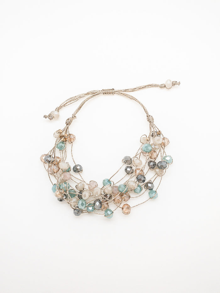 Stella beaded bracelet- aqua and pink. multiple strands of scattered beads.